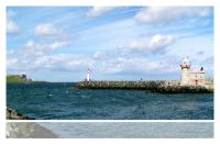 lighthouse Howth pier with lighthouse.